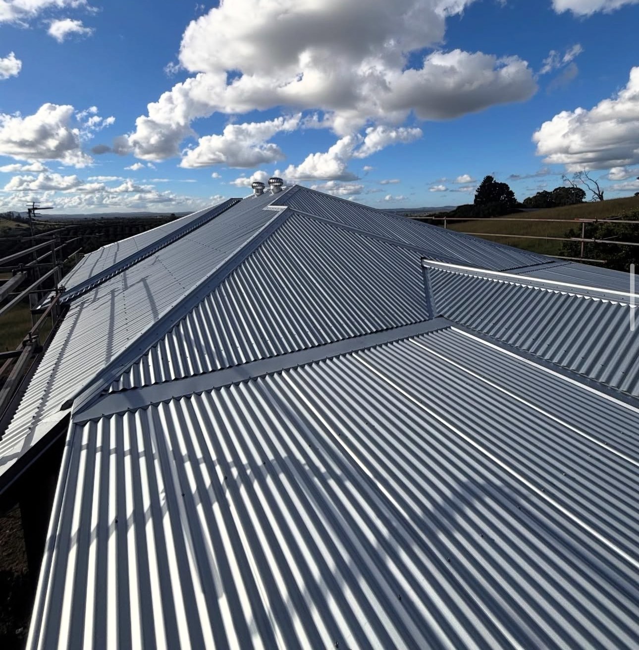 New metal roof under a blue sky on the Sunshine Coast