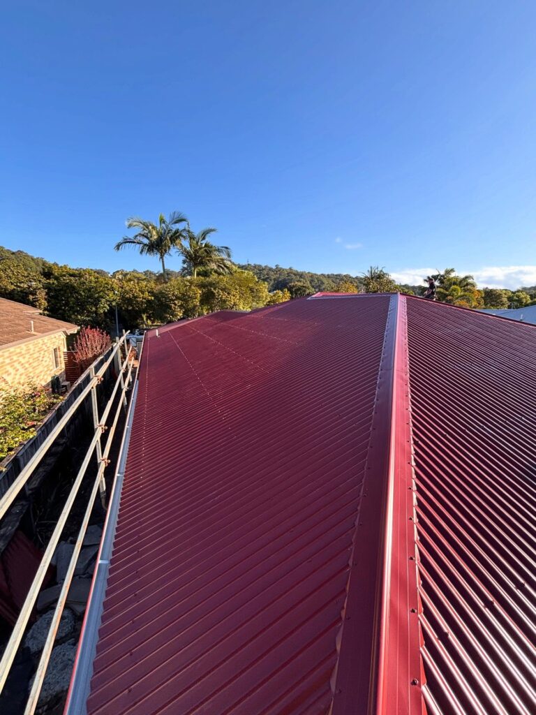 Red metal roof installed by Young Gunns Roofing in Bli Bli on the Sunshine Coast