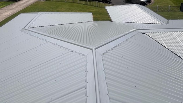 Completed metal roof with valley flashings, Sunshine Coast roofing by Young Gunns Roofing