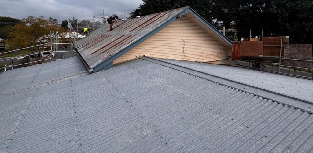Before: re-roof with new gable flashings on the Sunshine Coast